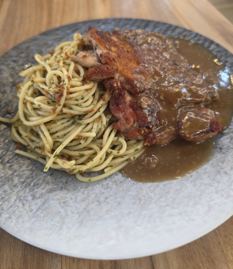 Generous Portions from Icon Steak That Will Leave You Satisfied 2 chicken chop with spaghetti