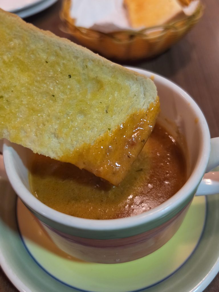 Tim’s Restaurant and Cafe: A Wonderful Neighbourhood Spot for Steak, Seafood & Nepali Flavours 11 Dipping Bread into Tomato Basil Soup
